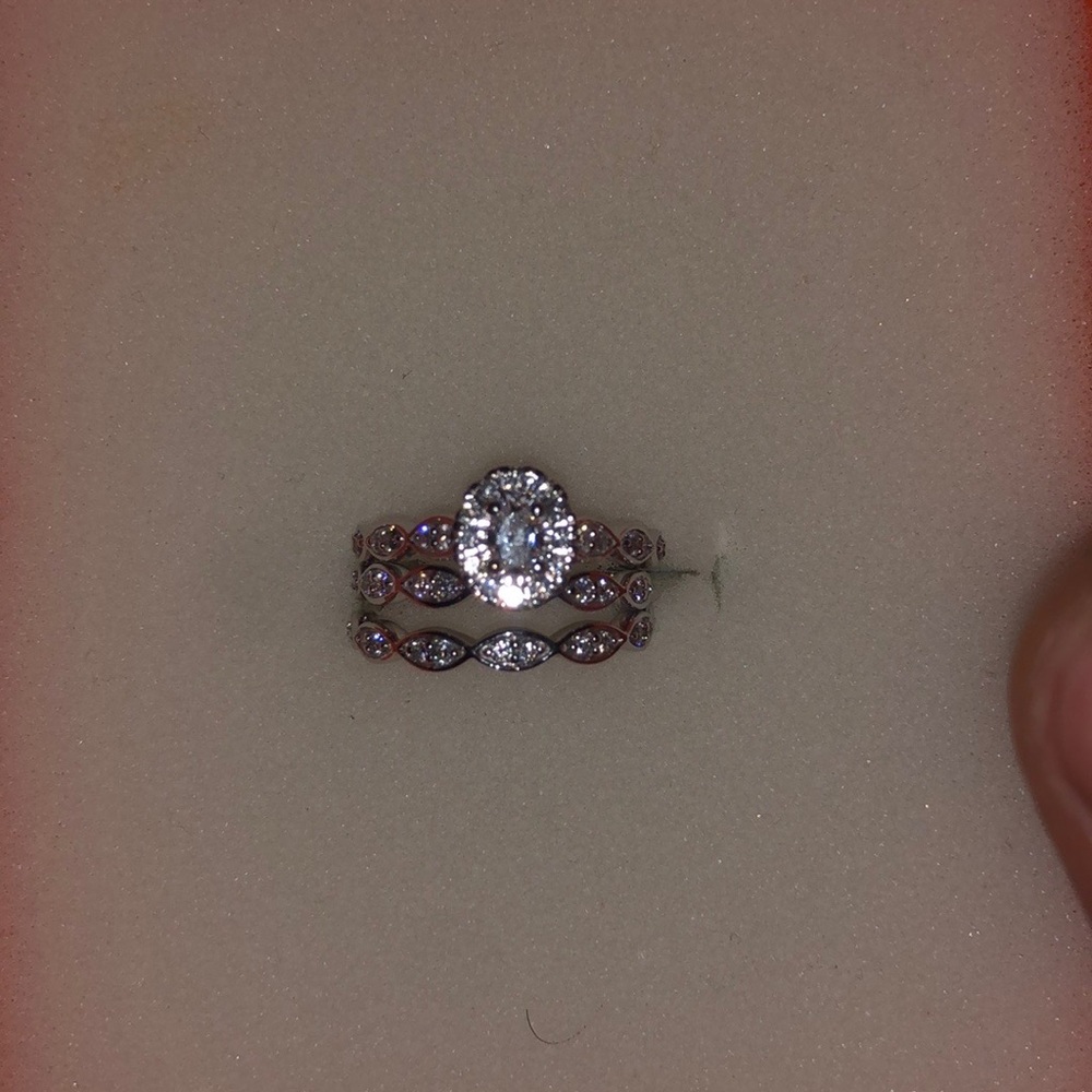 Vera Wang 3set wedding ring priced at 5,000 . 14k VS Diamonds .